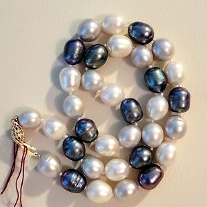 12mm Pearls cultured 18" 14KT yellow gold clasp